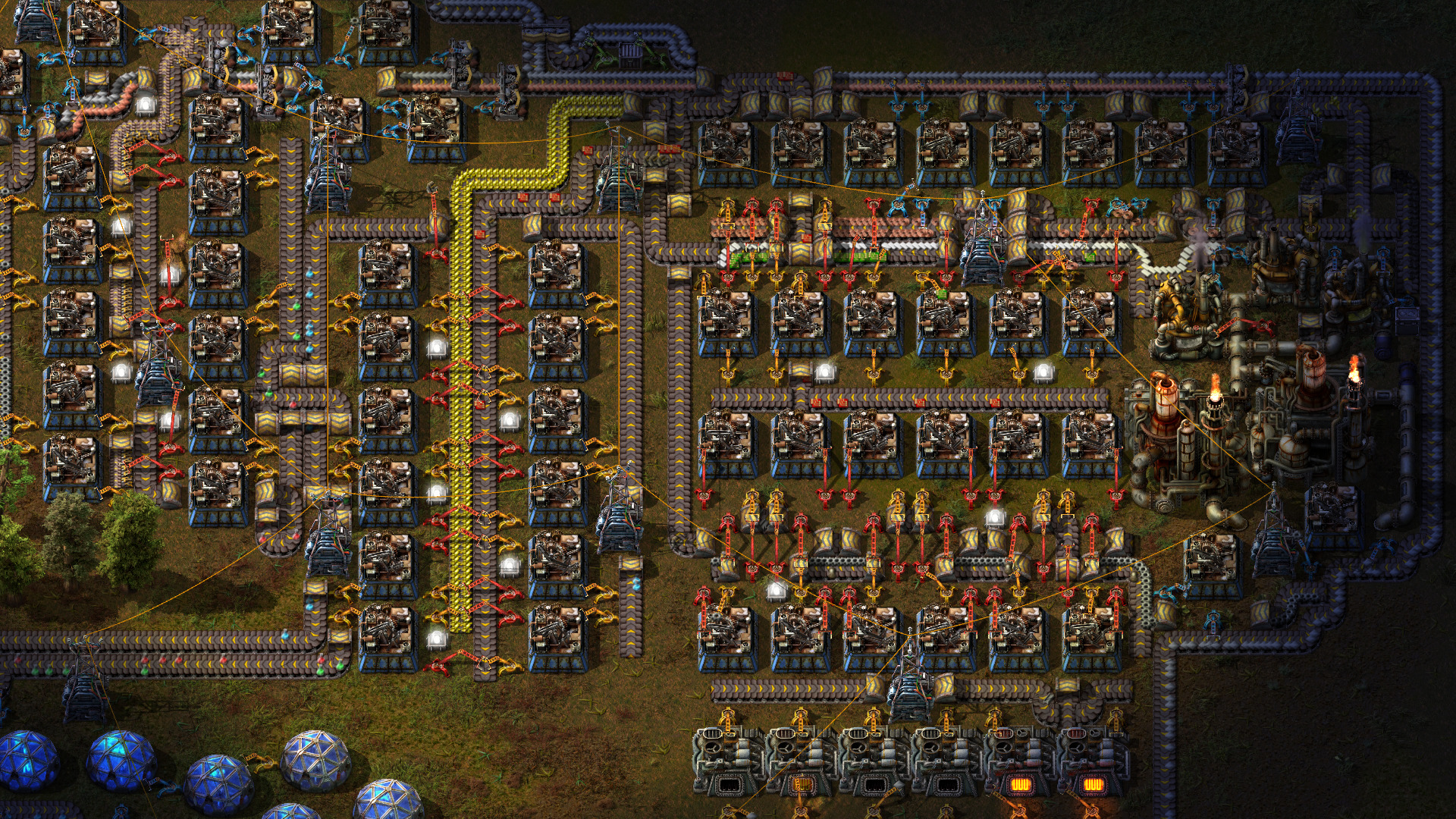 Factorio production area with assemblers, labs and belts feeding early science automation