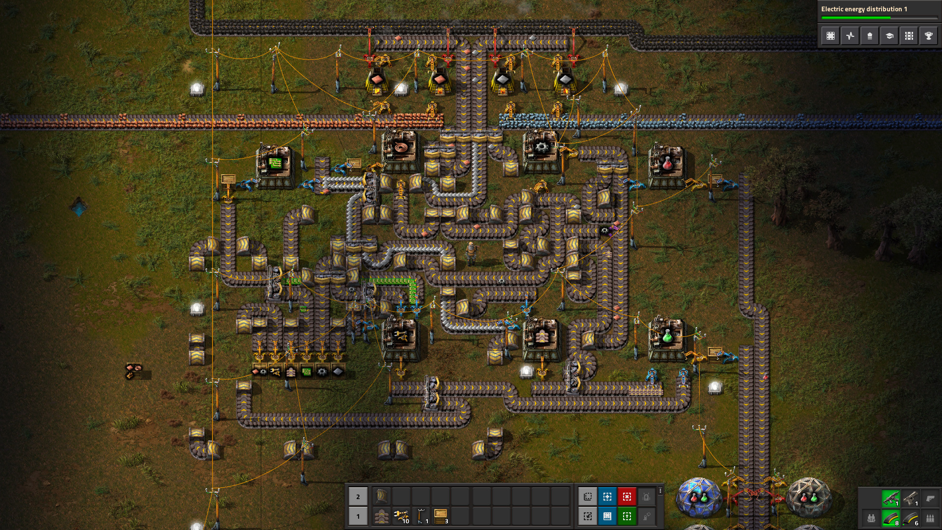 Early Factorio factory with belts and assemblers before a logistic robot network is added around the mall